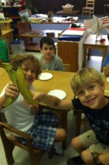 Students cooking plantains during Spanish week at summer camp
